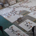 White marble floor tiles floral pattern carpet
